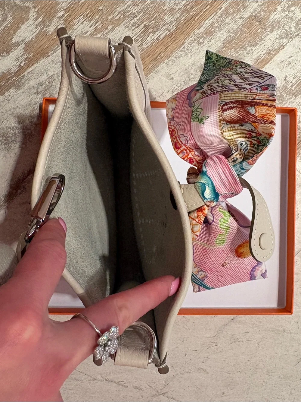 Hermes Cream Pebbled Leather Crossbody with Pink Scarf Accent